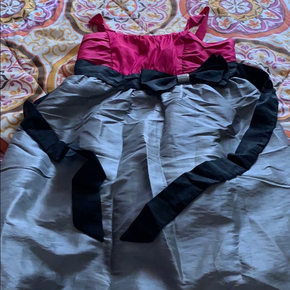A pink, gray, and black kids dress